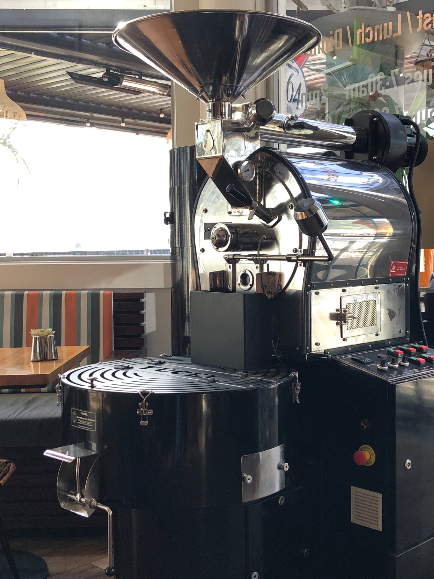 Black and chrome 10kg Yucel coffee roaster installed in a café for commercial roasting Turkey Auckland NZ Sydney Brisbane Melbourne Perth Adelaide Australia