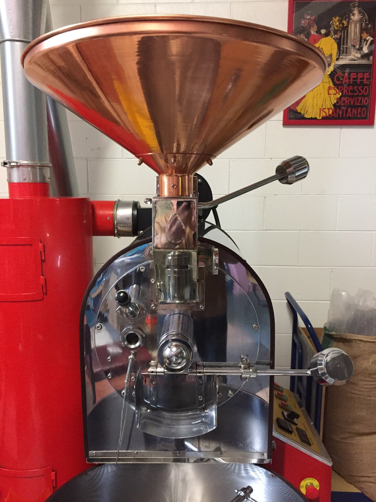 Red Yucel coffee roaster with copper hopper for loading coffee beans