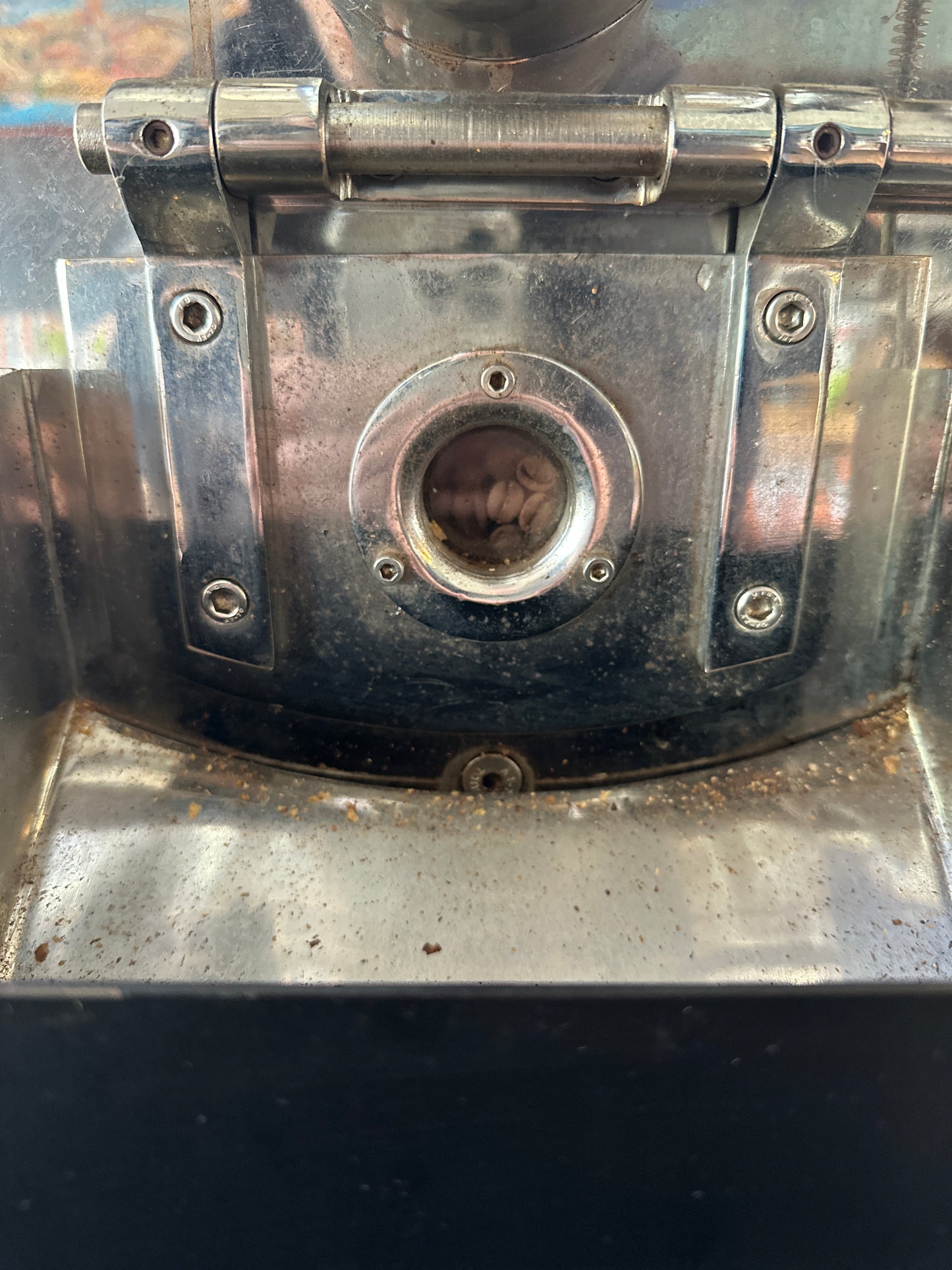 Coffee beans roasting inside a Yucel coffee roaster while being monitored
