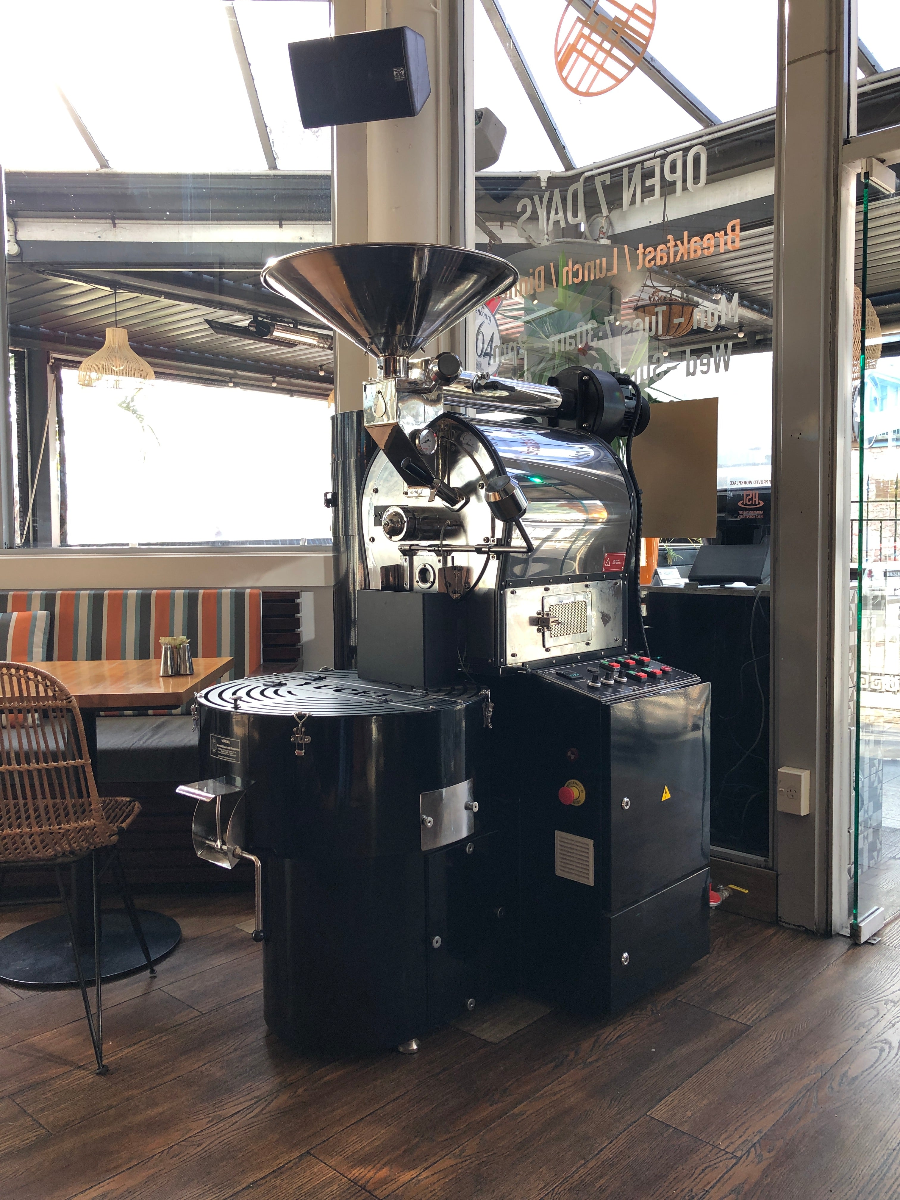 Turkish coffee roaster featuring black and stainless steel design for modern roasteries and cafes